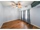 Basement bedroom with light blue walls and bamboo flooring at 2034 Haydenbrook Nw Dr, Acworth, GA 30101