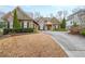 Charming two-story home with a landscaped front yard and a welcoming driveway at 2034 Haydenbrook Nw Dr, Acworth, GA 30101