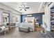 Main bedroom with ceiling fan and walk-in closet at 3080 Cedar Glade Ln, Buford, GA 30519