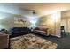 Living room with two sofas and a stylish area rug at 354 Tarragon Sw Way, Atlanta, GA 30331