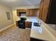 Updated kitchen boasts modern cabinetry and countertops at 1877 Lomita Rd, Atlanta, GA 30316