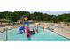 Aerial view of a splash pad area with a colorful water play structure at 243 Yorkshire Ln, Villa Rica, GA 30180