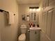 Small bathroom with toilet and sink vanity at 3426 Treadwell Sw Cir, Atlanta, GA 30331