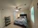 Spacious bedroom with ceiling fan, comfortable bed, and natural light at 3426 Treadwell Sw Cir, Atlanta, GA 30331