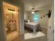 Cozy bedroom with attached bathroom and a comfortable bed at 3426 Treadwell Sw Cir, Atlanta, GA 30331
