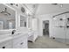 Elegant bathroom with double vanity and glass shower at 5435 Cole Creek Ln, Cumming, GA 30040