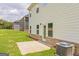 Rear view of a house showing a patio, and a backyard at 1620 Fuma Leaf Way, Mcdonough, GA 30253