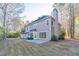 House exterior showcasing a large backyard and patio at 1237 Wynford Woods Sw, Marietta, GA 30064