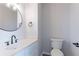 Updated bathroom with white vanity and modern fixtures at 1237 Wynford Woods Sw, Marietta, GA 30064