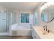Modern bathroom with a large soaking tub and walk-in shower at 1237 Wynford Woods Sw, Marietta, GA 30064