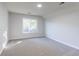 Cozy bedroom with a large window and ample natural light at 1237 Wynford Woods Sw, Marietta, GA 30064