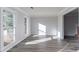 Bright dining room with hardwood floors and large windows at 1237 Wynford Woods Sw, Marietta, GA 30064