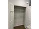 A pantry with open shelves for storage at 3810 Equity Ln, Powder Springs, GA 30127