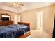 Bright bedroom with carpeted floor, ceiling fan and access to other rooms at 1488 Bellemeade Farms Sw Rd, Marietta, GA 30008