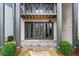 Charming backyard patio with flagstone flooring and French doors at 90 Sheridan Dr, Atlanta, GA 30305