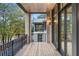 Private balcony with wood decking and metal railings at 90 Sheridan Dr, Atlanta, GA 30305