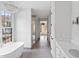 Luxurious bathroom with soaking tub, walk-in shower, and double vanity at 90 Sheridan Dr, Atlanta, GA 30305
