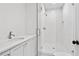 Clean bathroom with white tile shower and quartz countertop at 90 Sheridan Dr, Atlanta, GA 30305