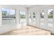 Bright bonus room with hardwood floors and access to a deck at 90 Sheridan Dr, Atlanta, GA 30305