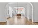 Bright dining room with hardwood floors and arched doorways at 90 Sheridan Dr, Atlanta, GA 30305