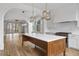 Open concept kitchen with large island and hardwood floors at 90 Sheridan Dr, Atlanta, GA 30305