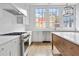 Modern kitchen with stainless steel appliances and white cabinets at 90 Sheridan Dr, Atlanta, GA 30305