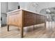 Large kitchen island with wood finish and brass hardware at 90 Sheridan Dr, Atlanta, GA 30305