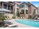 Community pool with plenty of lounge chairs at 90 Sheridan Dr, Atlanta, GA 30305