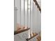 Detailed view of staircase with carved details and hardwood steps at 90 Sheridan Dr, Atlanta, GA 30305