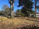 Residential front yard with mature trees at 4955 Campbellton Sw Rd, Atlanta, GA 30331