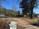 Spacious lot with mature trees and a large, flat front yard at 4955 Campbellton Sw Rd, Atlanta, GA 30331