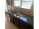 Kitchen sink and granite countertop with modern faucet at 5979 Rex Ridge Ct, Rex, GA 30273