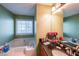 Main bathroom with garden tub, single vanity, and dark countertop at 242 Viola Dr, Dallas, GA 30157