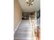 Home entryway with staircase leading to the second floor and a view of the living room at 242 Viola Dr, Dallas, GA 30157