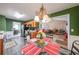 Kitchen with ample counter space, breakfast nook, and view of dining area at 242 Viola Dr, Dallas, GA 30157