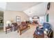 Spacious living area with a fireplace, large windows, and comfortable seating at 242 Viola Dr, Dallas, GA 30157