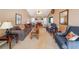 Cozy living room with a fireplace, vaulted ceiling, and comfortable furniture at 242 Viola Dr, Dallas, GA 30157
