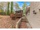 Deck and stairs leading to backyard with screened gazebo at 3390 Glenview Sw Cir, Atlanta, GA 30331