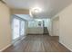 Finished basement with LVP flooring and access to patio at 3390 Glenview Sw Cir, Atlanta, GA 30331