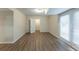 Spacious basement room with LVP flooring and French doors at 3390 Glenview Sw Cir, Atlanta, GA 30331