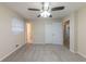 Bright bedroom with ceiling fan and access to bathroom at 3390 Glenview Sw Cir, Atlanta, GA 30331