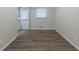 Spacious dining area with vinyl flooring and door to outside at 3390 Glenview Sw Cir, Atlanta, GA 30331