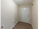 Laundry area with vinyl flooring and exterior access at 3390 Glenview Sw Cir, Atlanta, GA 30331