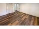 Bedroom with vinyl flooring and access to a bathroom and closet at 522 Jo Ann Se Dr, Marietta, GA 30067