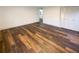 Well-lit bedroom with vinyl flooring and access to a hallway at 522 Jo Ann Se Dr, Marietta, GA 30067