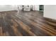 Spacious living room featuring wood-look vinyl flooring and an open floor plan at 522 Jo Ann Se Dr, Marietta, GA 30067