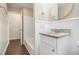 Clean bathroom with granite vanity and updated fixtures at 6979 Bruce Cir, Lithonia, GA 30058