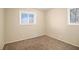 Spacious bedroom with neutral walls and carpet flooring at 6979 Bruce Cir, Lithonia, GA 30058