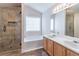 Modern bathroom with tiled shower, soaking tub, and double vanity at 4511 Keenly Valley Dr, Buford, GA 30519