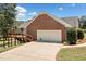 Attached garage with deck and ramp access at 289 Barn Rd, Canton, GA 30115